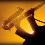awesome-jazz-music-saxophonist-silhouette-web-header